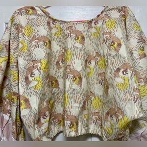 Fox Print Cropped Top with Yellow Accents
One of A Kind
Sold only in a Boutique